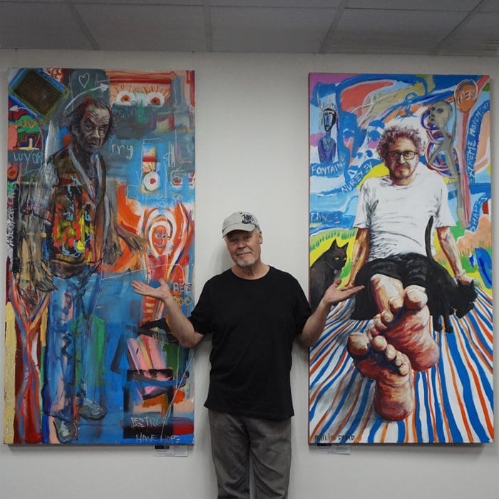 hang-logic-artiteq-shadowline-plasterboard-5 two large paintings with artist standing between them