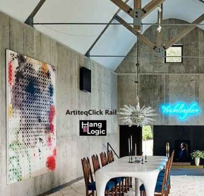 Artiteq Click Rail installed on a concrete wall displaying a large abstract painting, available at Hang Logic.