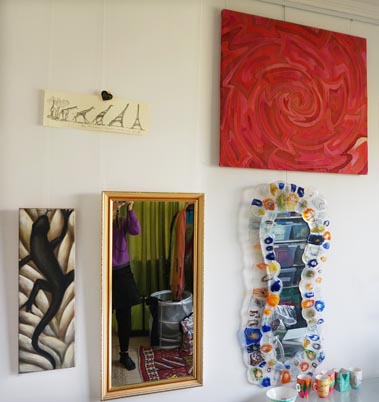 artiteq-click-rail-hanging-mirrors-hang-logic-300 colourful art and mirrors hung on wall with picture hanging rail