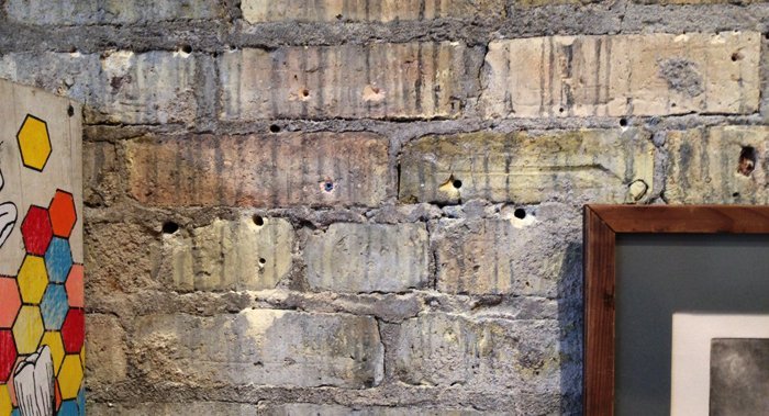 brick-wall-screw-damage-hang-logic Brick wall damages