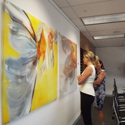 Click Rail Pro and paintings on display