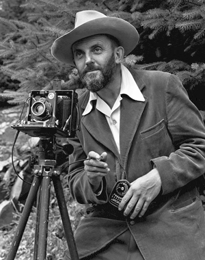 1200px-Ansel_Adams_and_camera Ansel Adams, Photographer, looking at camera