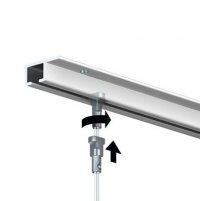 Illustration of a top rail with a Twister hanging wire being twisted into it for picture hanging.