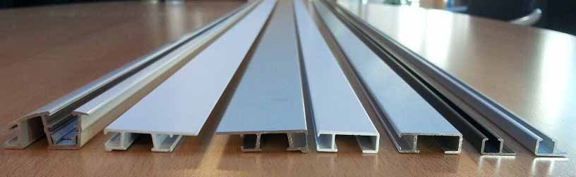 Artiteq picture rail colours displayed, including white primer, white, brushed aluminium, and black, showcasing the variety and versatility of finishes.