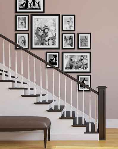 Art in staircase 1 Salon-style photo display along a residential staircase